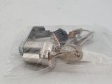 two keys in a plastic bag on a white surface