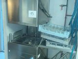 an image of a kitchen with a sink and a dishwasher