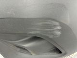 a close up of a car ' s door handle with a small dent