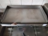 a pan that is sitting on top of a stove
