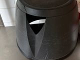 an image of a trash can sitting on a kitchen counter