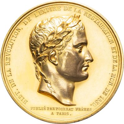 pièce d'or représentant le portrait d'un homme coiffé d'une couronne