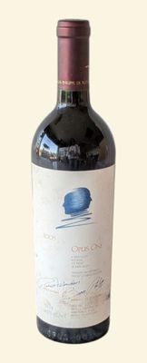 a bottle of wine that is sitting on a table