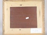 an old picture frame with a piece of paper in it