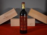 a bottle of wine that is sitting on a table