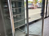 an image of a commercial refrigerator in a store