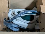 a box that has a pair of shoes in it