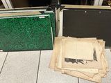 many folders sitting on the floor next to each other