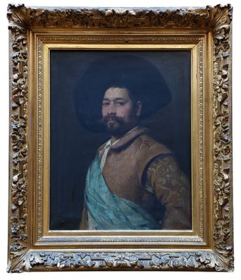 portrait d'un homme barbu portant une robe bleue, dans un cadre doré