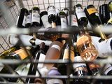 many bottles of wine in a wire basket