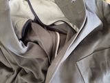 a pile of clothes sitting on top of a wooden table