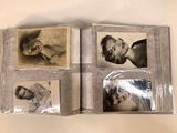 three old black and white photos of a man and a woman in a photo album