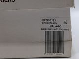 a white box with a barcode on it on a white surface