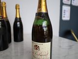 a bottle of wine that is sitting on a table