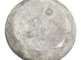 a gray stone bowl with a white lid on a white background