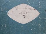 a piece of paper with writing on it sitting on a table