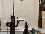 a lamp that is sitting on a table in a room