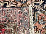 an image of a close up of a rug with a cat laying on it