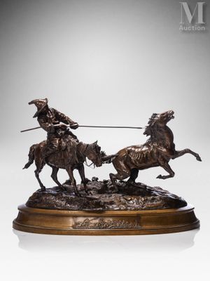 a bronze statue of two men on horses with a dog