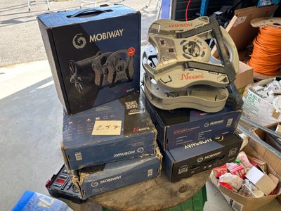 a lot of boxes and boxes of electronics on a table