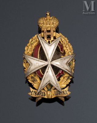 an image of a military badge with a star on top of it