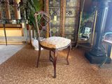 a chair that is sitting in the middle of a room
