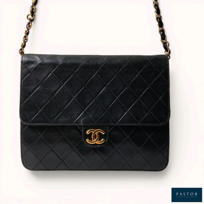 a chanel black quilted leather shoulder bag with gold hardware