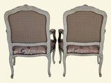 pair of antique french style chairs with upholstered back cushions