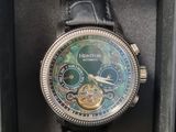 a watch in a box with a watch inside of it