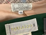 a close up of a label on a green shirt