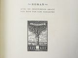 an open book with a picture of a tree on the cover