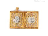 a close up of a gold and silver locke with a clock on it