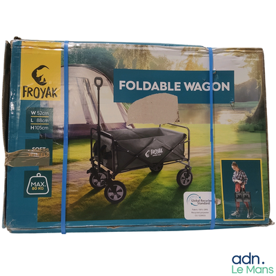 une photo d'un chariot pliable qui se trouve dans la boîte