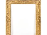 a gold frame with a white background and a white wall