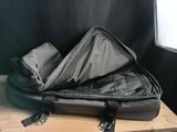 a piece of luggage sitting on top of a wooden table