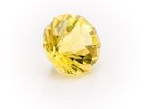 a yellow diamond on a white background