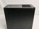 an image of a black computer case sitting on top of a white table