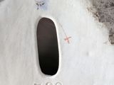 a close up of a white vase with a number on it