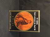 a box of cigarettes sitting on a black surface