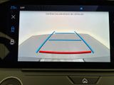 a picture of a car ' s rear view camera on the dashboard