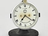 a clock with roman numerals on the face of it