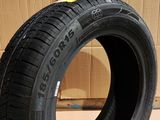 a close up of a tire on a cardboard box on a floor