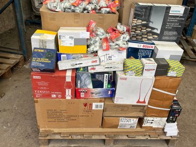 many boxes of food on a pallet in a warehouse