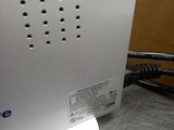 a close up of a white computer on a table