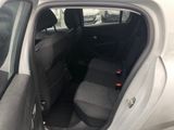 the back seats of a car are empty in the parking lot