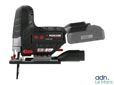 a black and decker corded jig saw on a white background