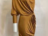 a mannequin wearing a brown dress on a mannequin mannequin mannequin mannequin mannequin mannequin mannequin mann