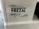 an image of a freezer that is sitting on top of a counter