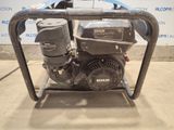 a small engine that is sitting on a stand