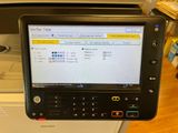 an image of a printer with a scanner in the background